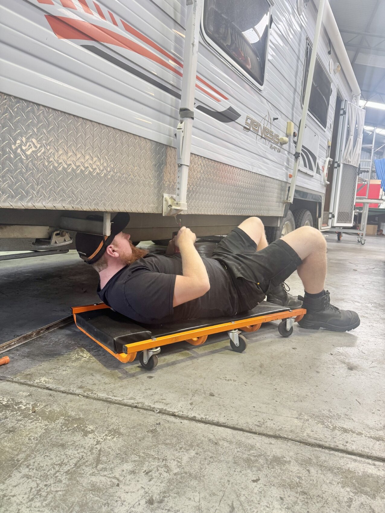 Vanaid technician carrying out mobile caravan repairs